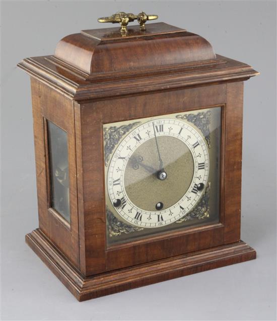 A 1930s walnut chiming bracket clock, copying a model by Thomas Tompion, height 11.5in.